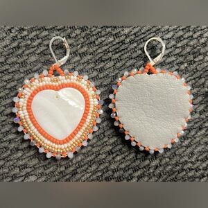 Orange beaded dangle earrings
